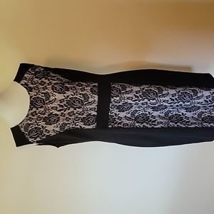 Black Polyester dress with front/back lace details.  Sz 10